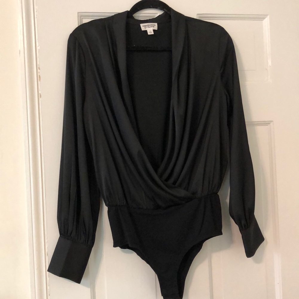 Long sleeve black bodysuit with clasp in the front